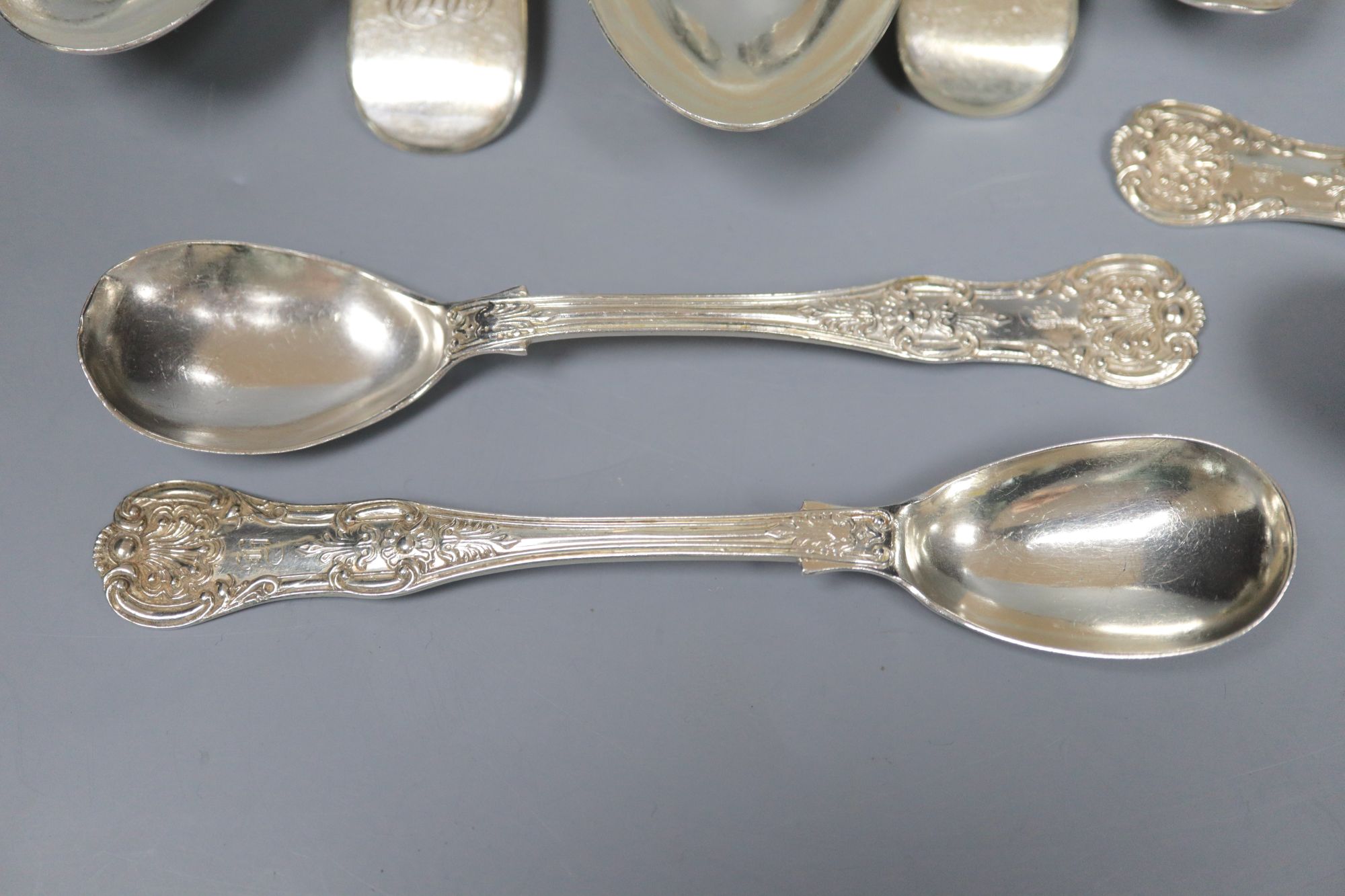 A group of assorted 19th century silver flatware including two caddy spoons (one Scottish) and a napkin ring,